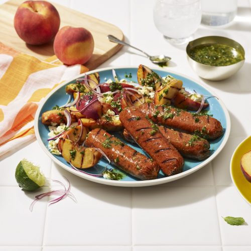Impossible™ Grilled Sausage Links with Summer Peach Salad